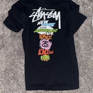 Stussy Black Tee with Vibrant City Graphics